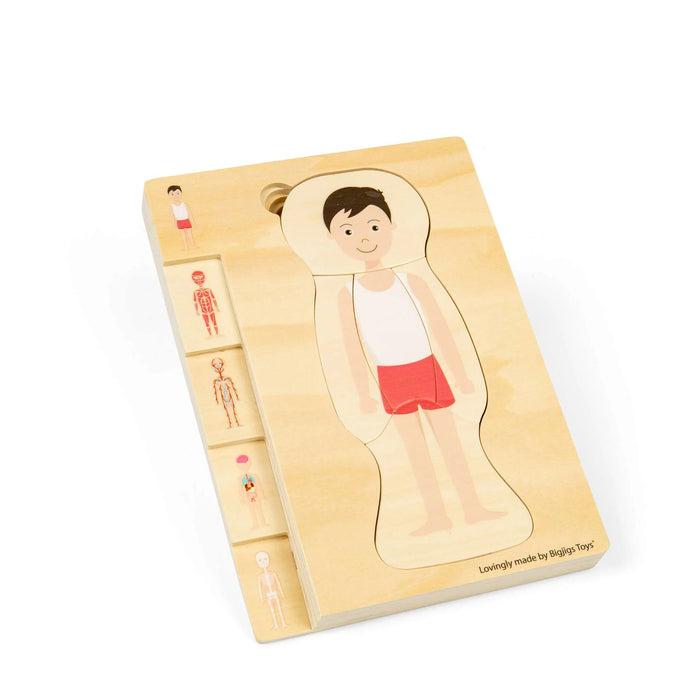 Púsluspil tré strákur líkaminn